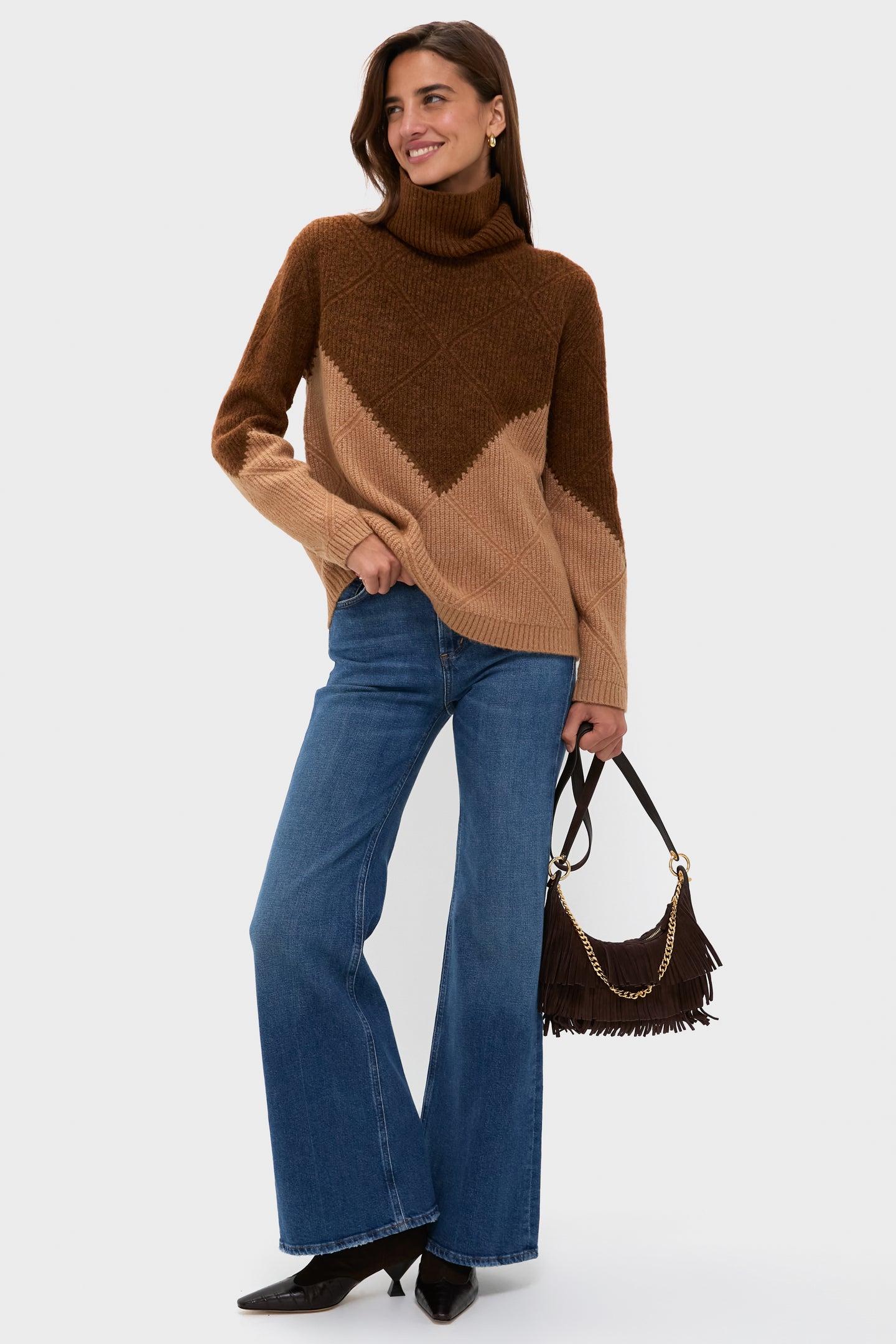 Young adult wearing the Tan & Brown Diamond Demi Turtleneck, showcasing a classic, effortless, and fun fall look with a high-end finish.