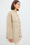 Classic and effortless, the Beige Chine Florian Coat features a soft, oversized shacket design with button-front, flap pockets, and buttoned cuffs, epitomizing high-end, fun layering.
