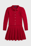 A Polo Ralph Lauren red cotton knit dress features long sleeves, a collared button-down front, pleated skirt, and a small embroidered chest logo—perfect for showcasing classic American style.