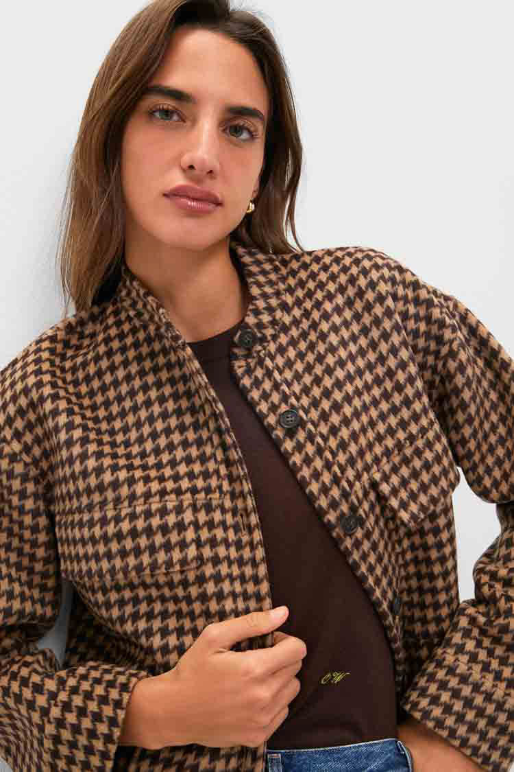 Woman wearing the Noir and Noisette Florian Coat, a classic, high-end houndstooth shirt-jacket. Effortless and chic, perfect for layering with fun, versatile styling.
