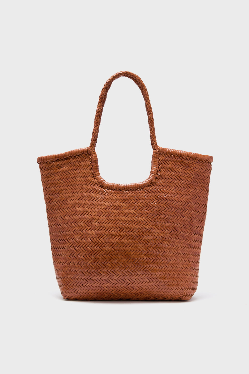 The Dragon Diffusion brown handwoven straw tote bag features braided handles and is perfect for carrying your essentials.