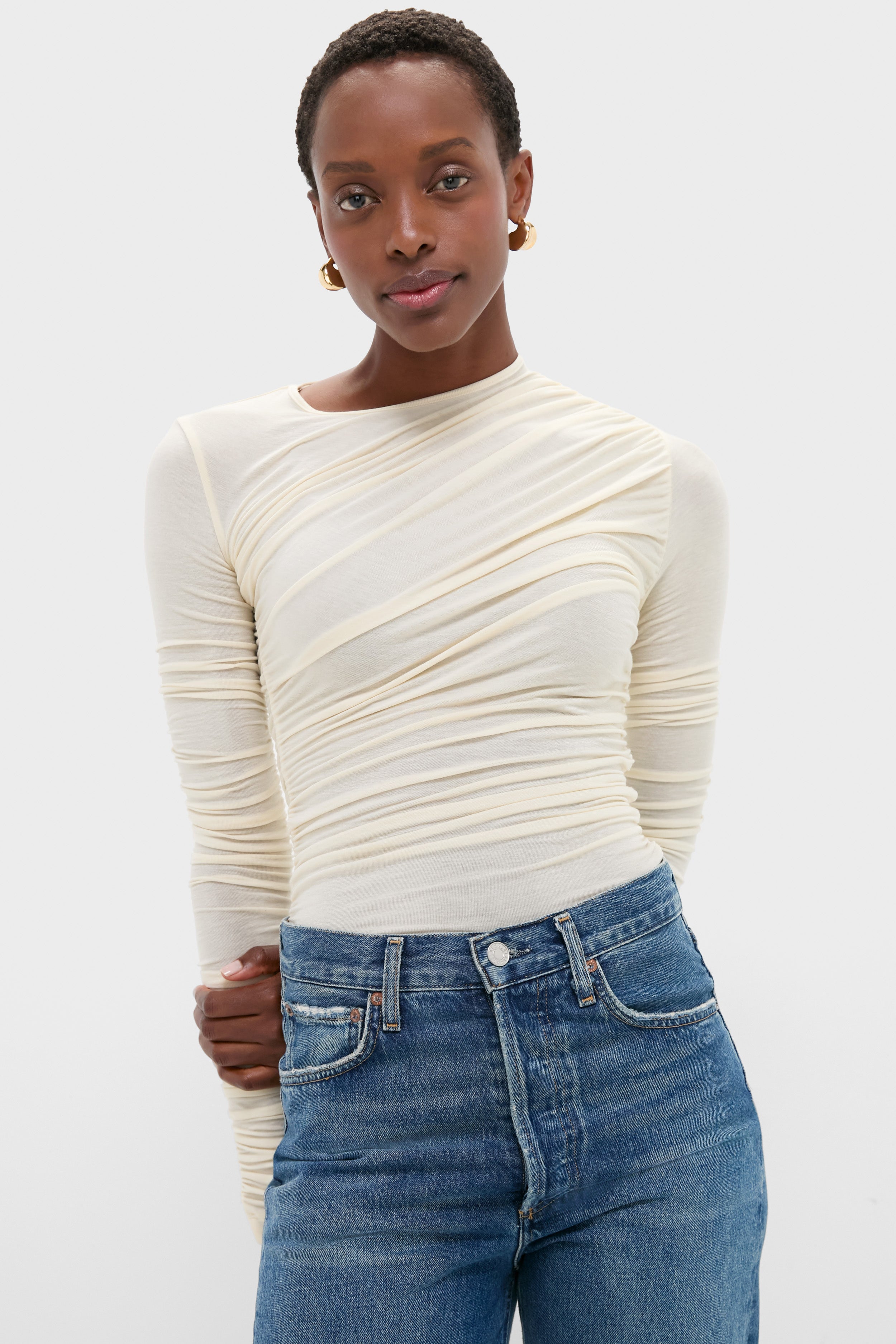 TENDELOlN TEE L/S AClDS ダリスカルロンT Oat Milk Tania Twist Tee | AGOLDE