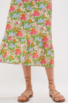 A person models the Multi Green Begonia Floral Mimi Midi Dress.