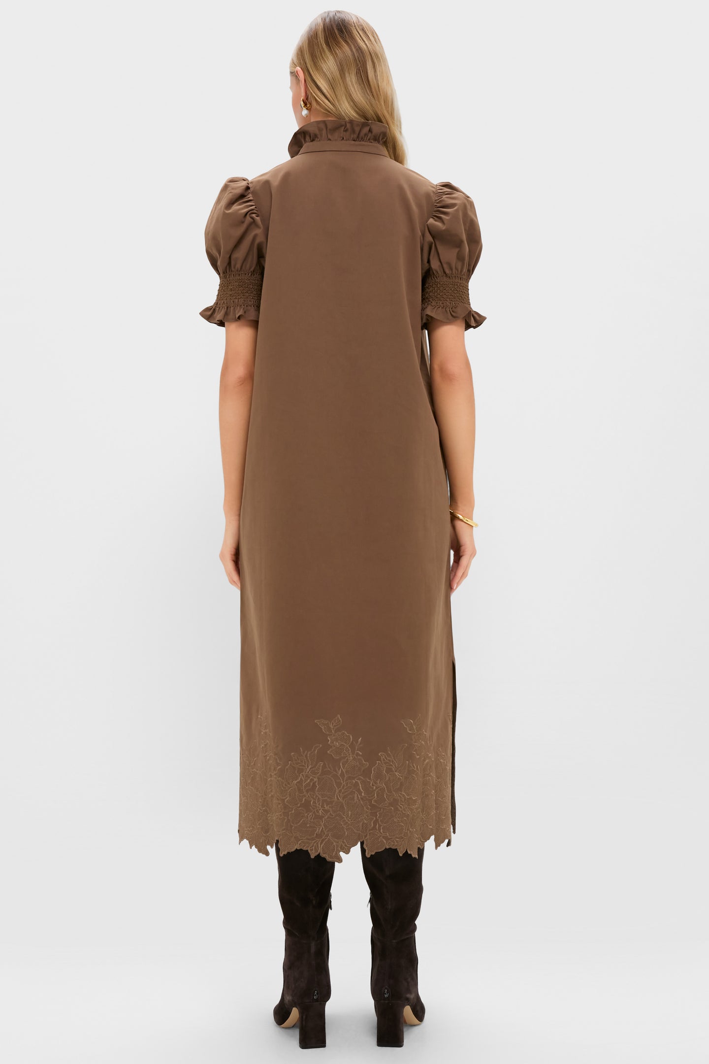Woman in the Mocha Embroidery Eliza Midi Dress showcasing classic, effortless style with a high-end ruffled collar, puff sleeves, and embroidered hem.