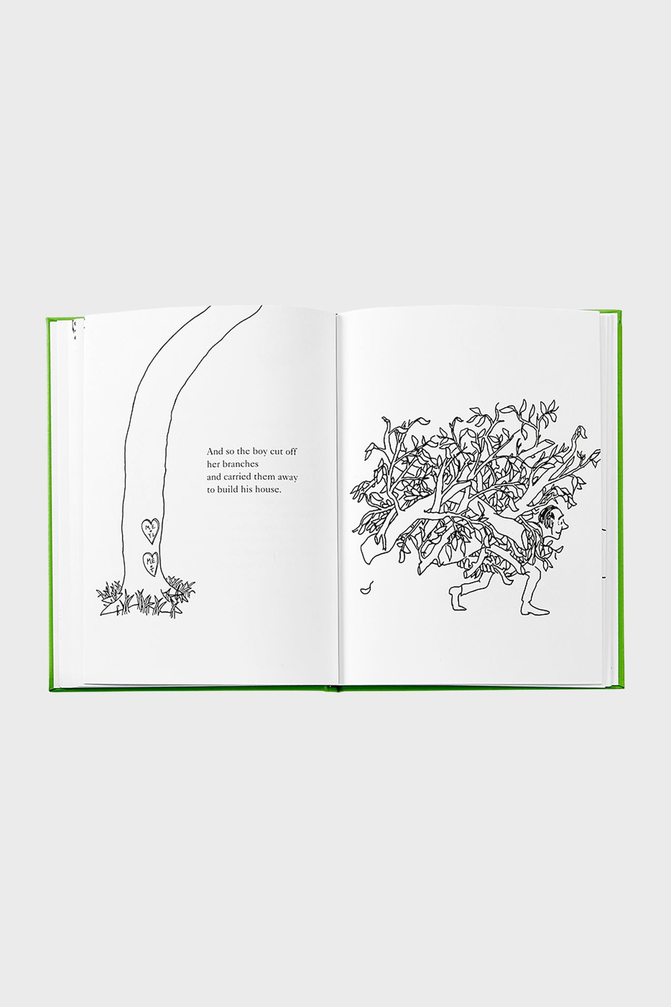 Classic children’s book, The Giving Tree, open to a page with simple line drawings depicting a boy carrying tree branches, embodying effortless fun and high-end storytelling.
