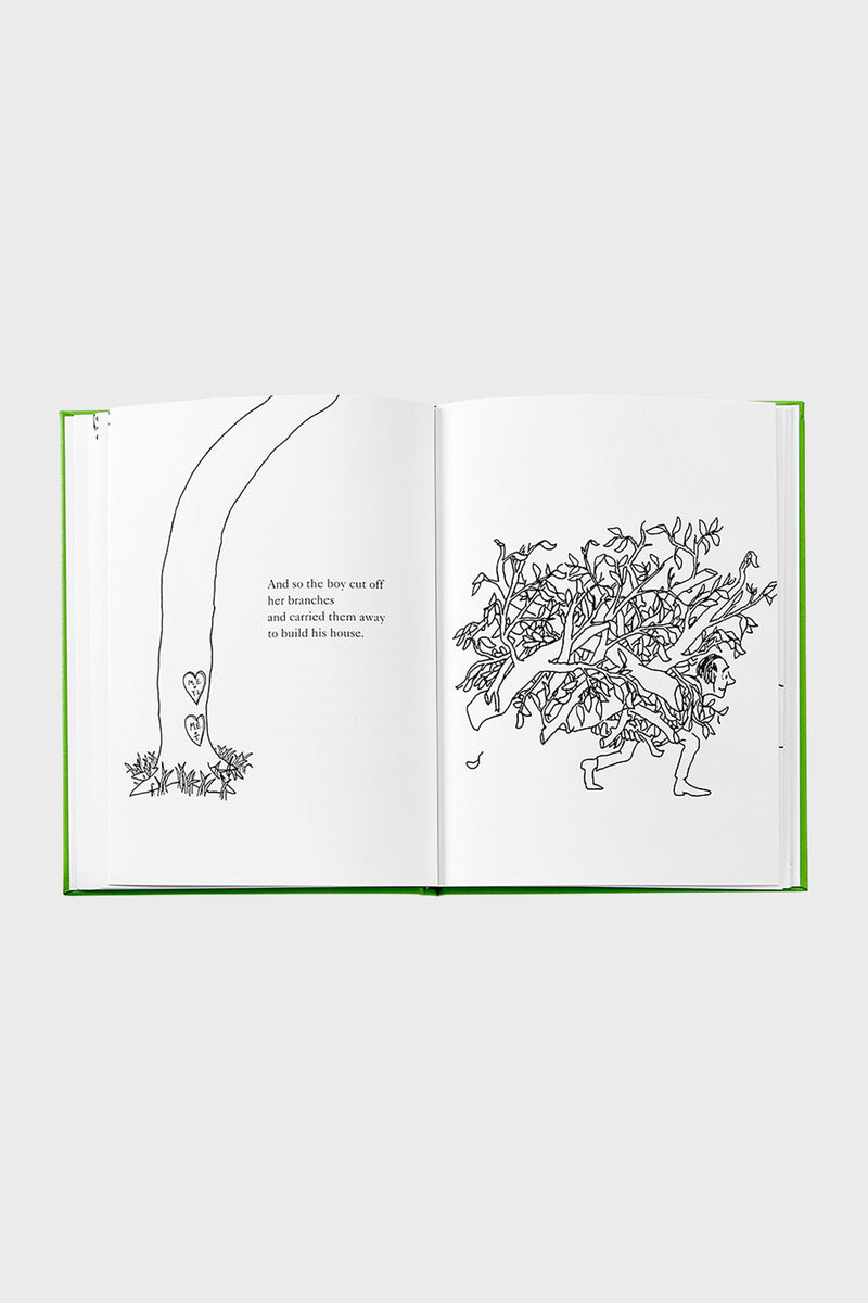 Classic children’s book, The Giving Tree, open to a page with simple line drawings depicting a boy carrying tree branches, embodying effortless fun and high-end storytelling.
