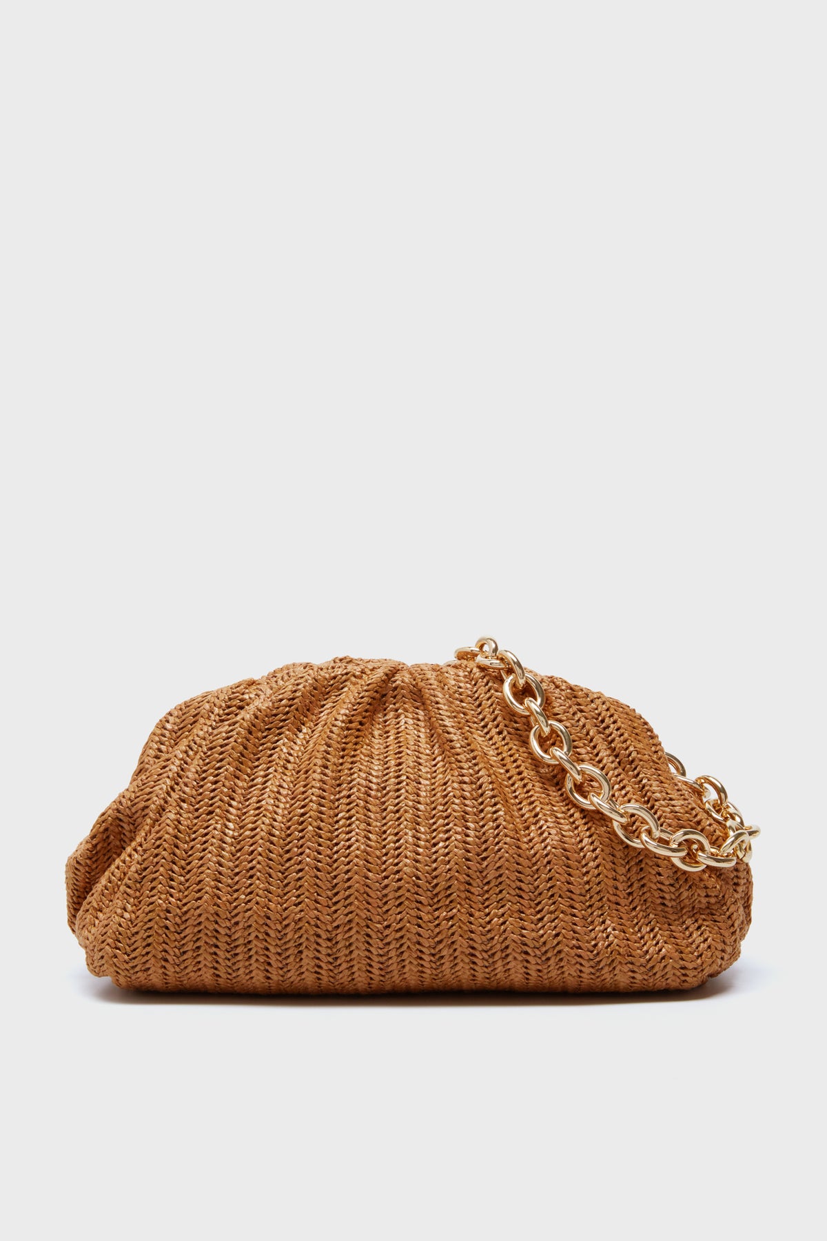 The Tuckernuck Accessories Dark Raffia Slouchy Clutch features a brown woven design, oversized slouch style, and a gold chain strap.