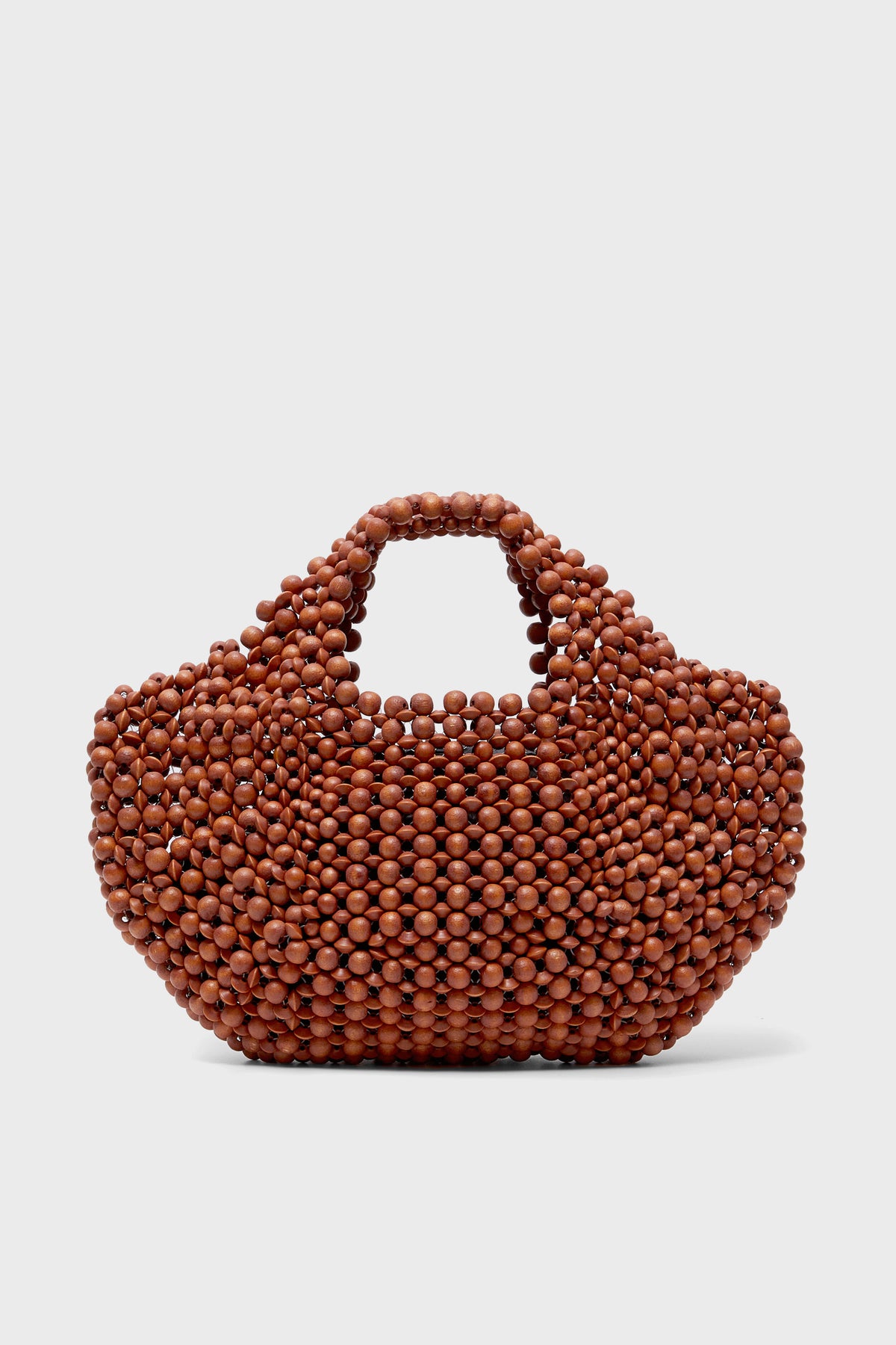 The Aranaz brown beaded tote features round wooden beads, two handles, and a structured, rounded shape—perfect for fans of the brand's signature style.