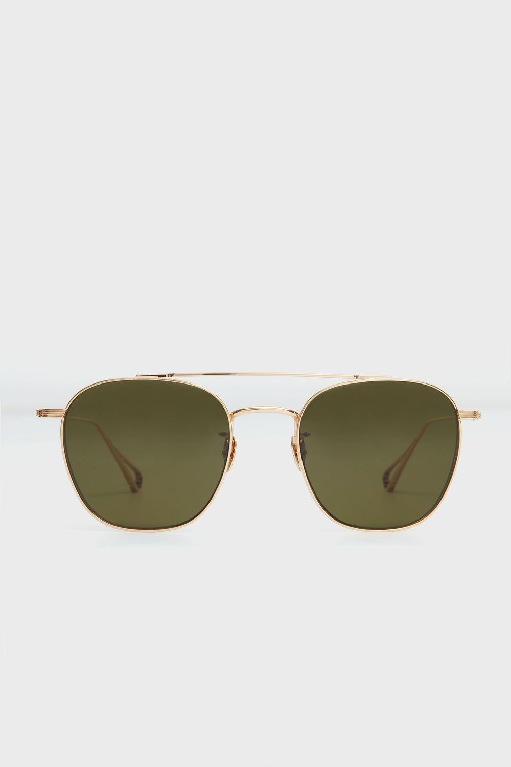 KREWE du optic's gold-framed aviator sunglasses feature handcrafted frames and 24k titanium, plus green-tinted polarized lenses for superior style and clarity.