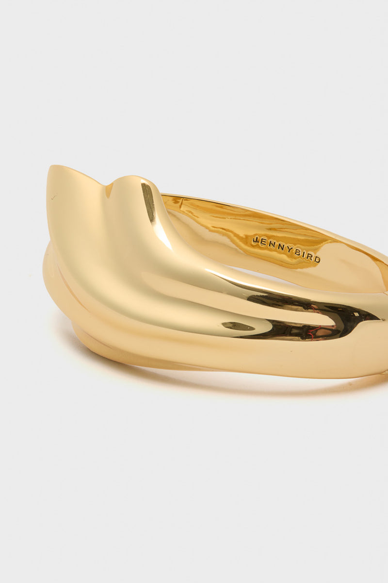High Polish Gold Lydia Cuff by Jenny Bird, a classic, high-end bangle with an effortless, organic wavy design and hinge closure for fun, sophisticated styling.