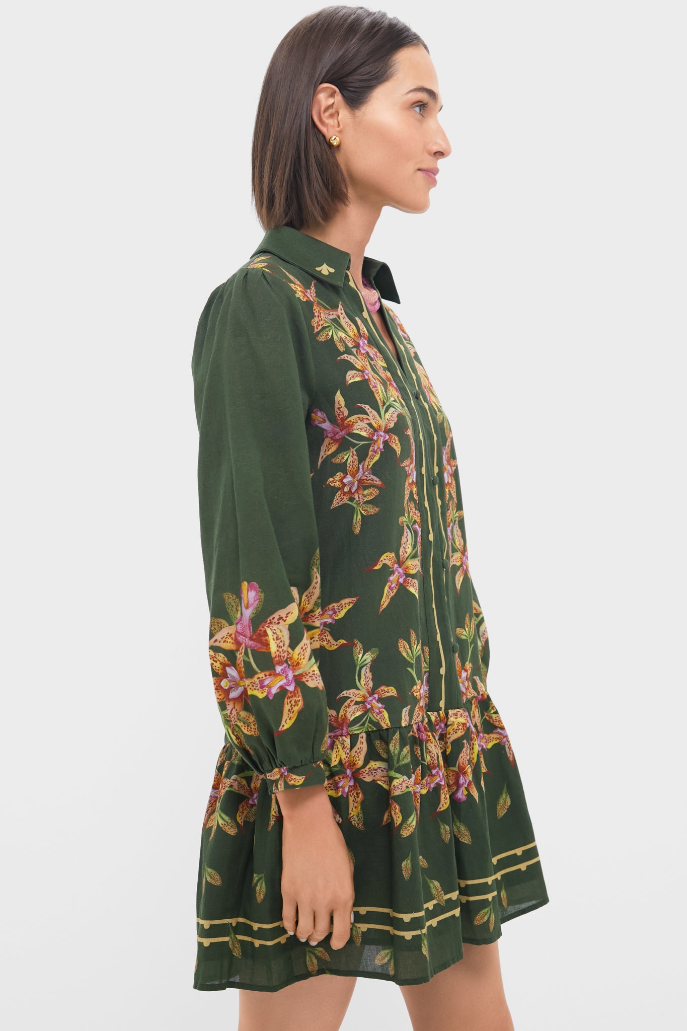 Hunter Lilly Porter Mini Dress: A classic, effortless mini with a chic V-neckline, puffed sleeves, and flounced hem, perfect for fun, high-end day-to-night transitions.