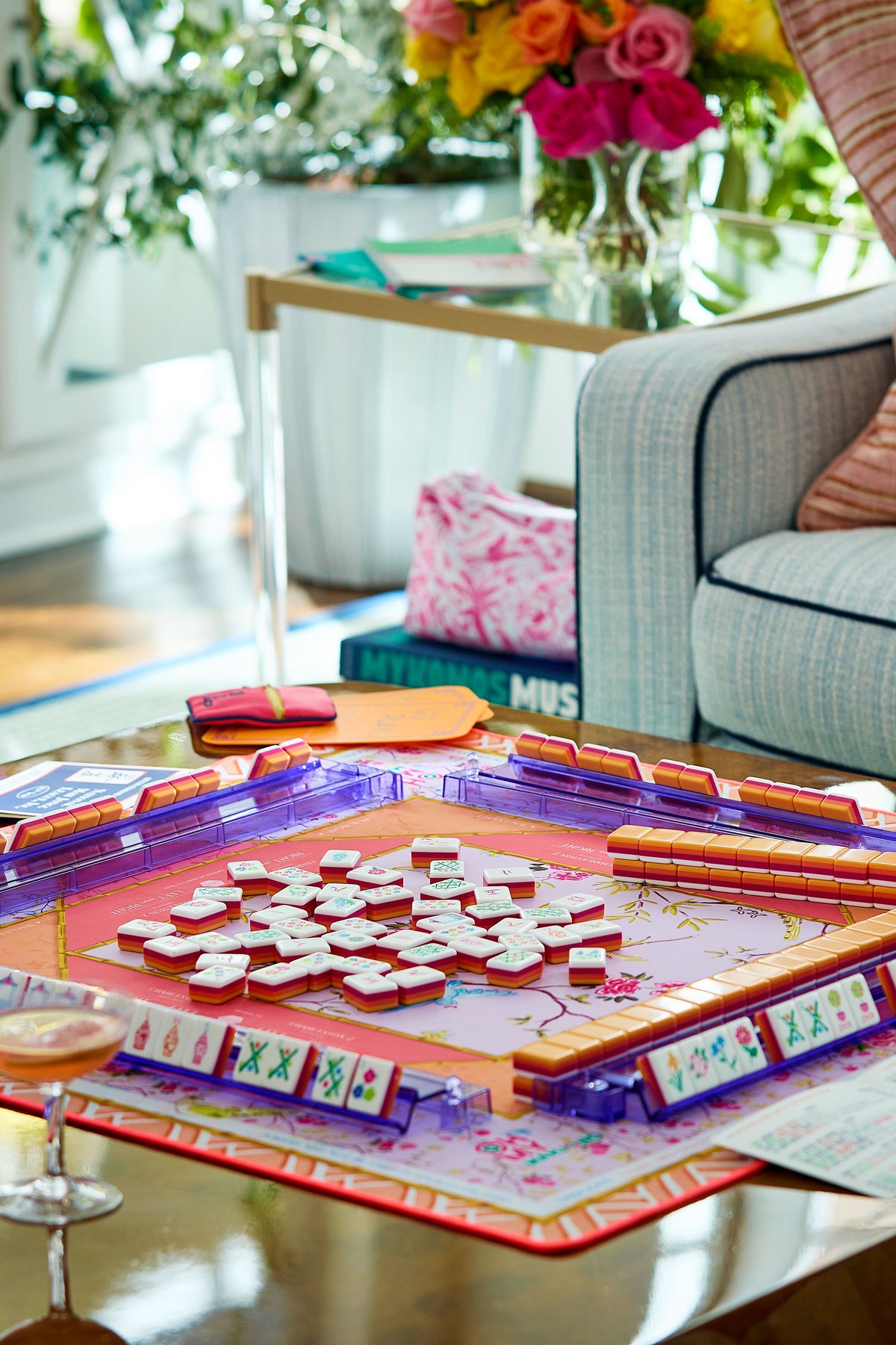 Goldie Playing Mat, with its vibrant floral design, enhances this classic, high-end mahjong setup, making the game effortlessly fun with its non-slip surface and instructional edges.