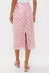 Soft Pink Shimmer Stripes Milan Midi Skirt with diagonal sequins and back slit, styled with blush velvet mules for a classic, effortless, and high-end look.