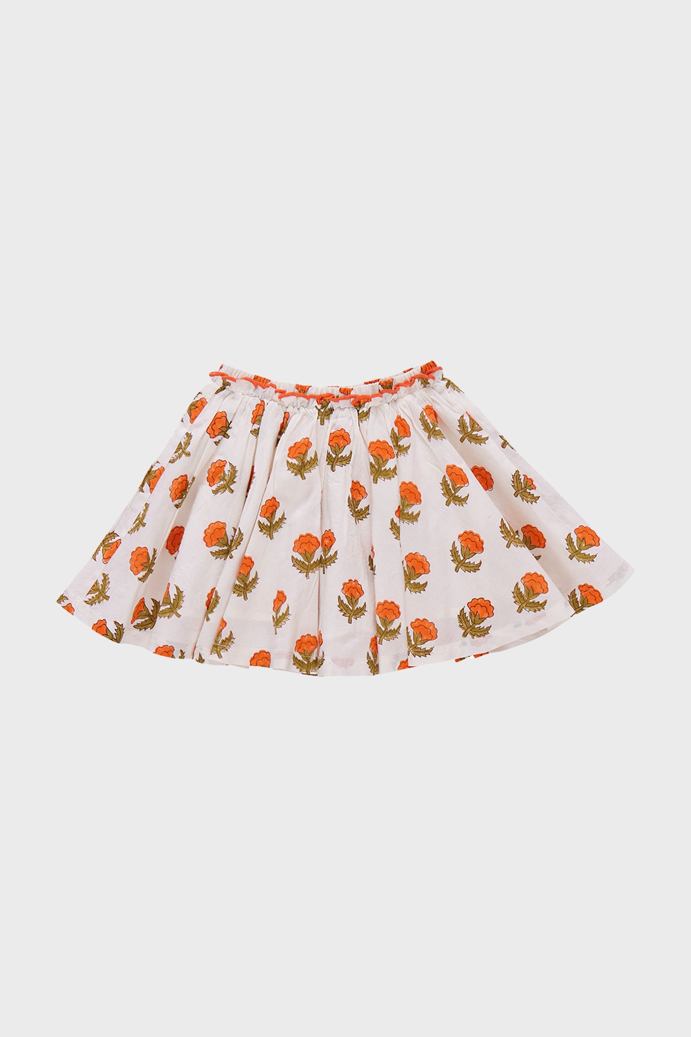 The Pink Chicken Orange Bud Gianna Skirt has a white base with a marigold print and a gathered waistband, offering boho style for any wardrobe. Shown on a plain background.