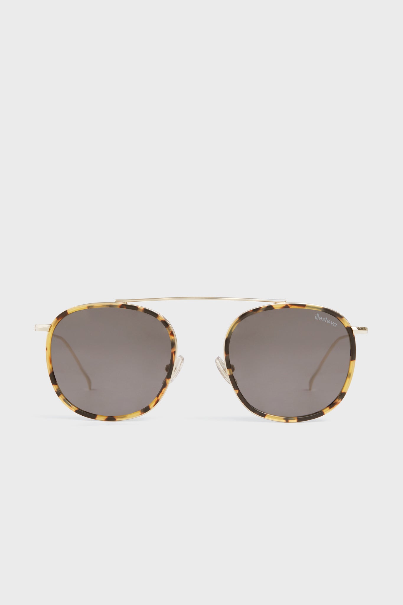 Illesteva square sunglasses feature tortoiseshell acetate frames, dark lenses, and a thin gold bridge—offering fans of classic eyewear a fresh update with signature brand style.