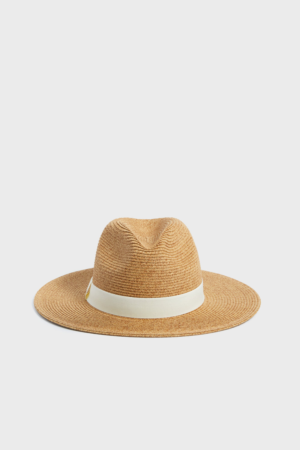 The Toucan Hats wide-brimmed brown straw fedora features a cream band and is perfect as a packable beach hat or stylish sun hat for sun protection.