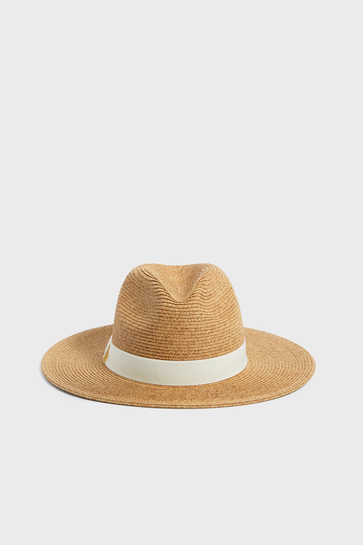 The Toucan Hats wide-brimmed brown straw fedora features a cream band and is perfect as a packable beach hat or stylish sun hat for sun protection.