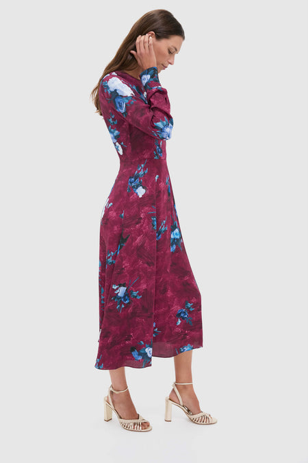 Abstract Rose Milberry Red Long Sleeve Midi Dress on a model, showcasing classic elegance with painterly floral motifs for an effortless, high-end look. Perfect for fun, sophisticated events.