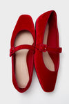 Red Velvet Ginger Mary Jane Flats boast a classic square toe, adjustable strap, and luxurious velvet finish, embodying effortless, high-end style for a fun, casual elegance.
