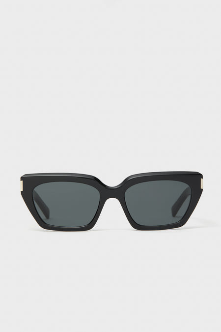 Saint Laurent black cat-eye sunglasses featuring dark lenses and gold corner accents, inspired by Yves Saint Laurent.