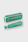 Marvis Classic Strong Mint toothpaste and box, showcasing a high-end, classic design. Offers effortless, fun oral care with long-lasting freshness and minty aroma.