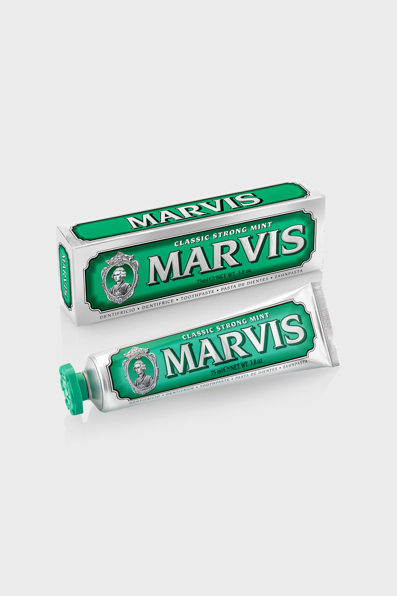 Marvis Classic Strong Mint toothpaste and box, showcasing a high-end, classic design. Offers effortless, fun oral care with long-lasting freshness and minty aroma.