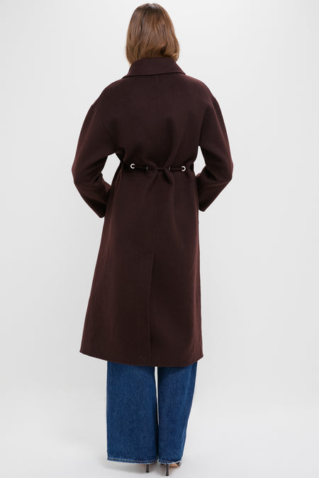 Person wearing the classic Chocolate Kate Coat with a wide V-collar and drawstring waist, over wide-leg jeans and heeled shoes, embodying effortless, high-end style.