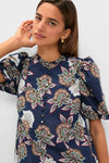 Navy Floral Mimi Mini Dress with classic puff sleeves and ruffle collar, epitomizing effortless, fun style with a high-end floral print and button details.
