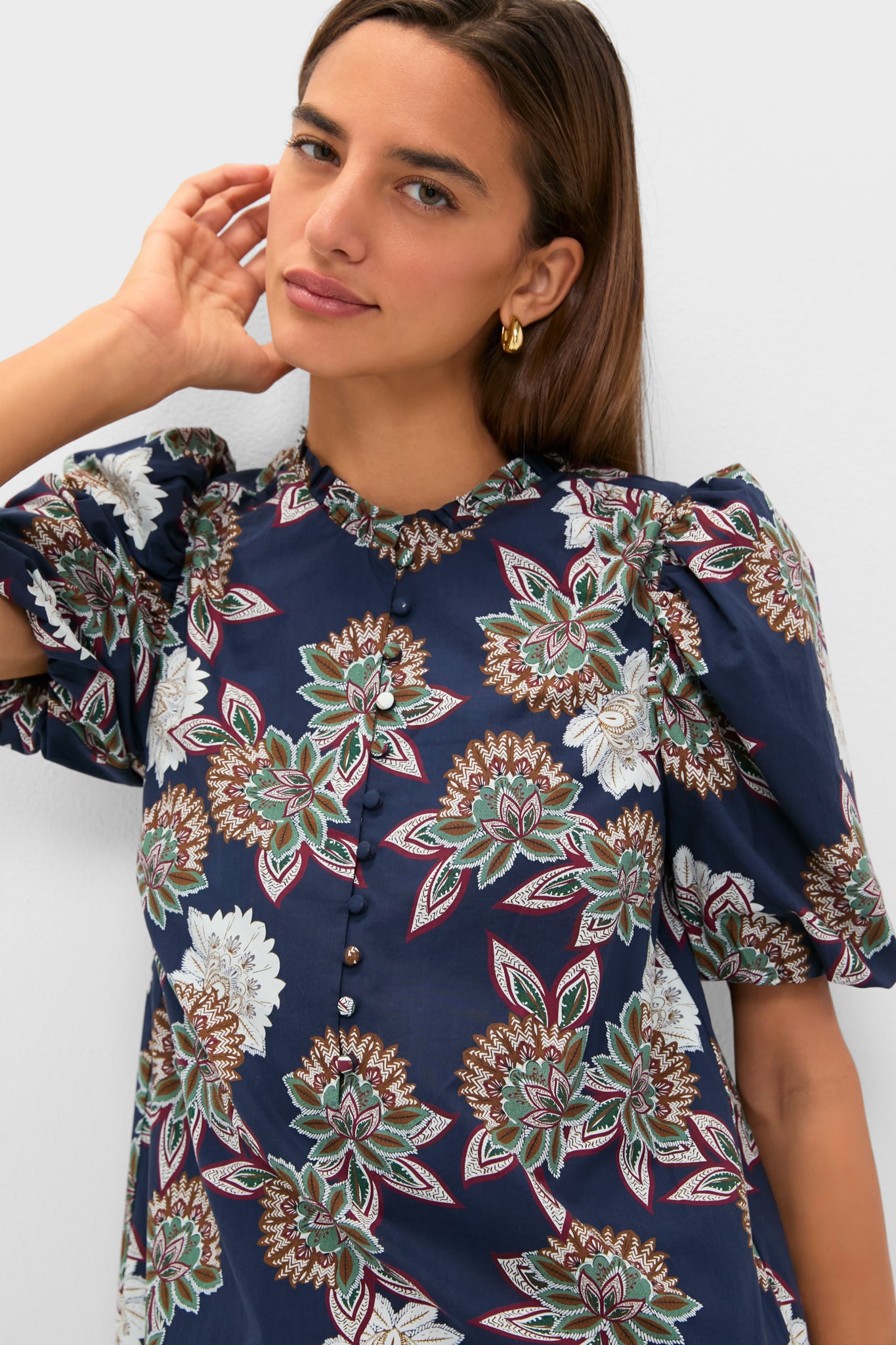 Navy Floral Mimi Mini Dress with classic puff sleeves and ruffle collar, epitomizing effortless, fun style with a high-end floral print and button details.