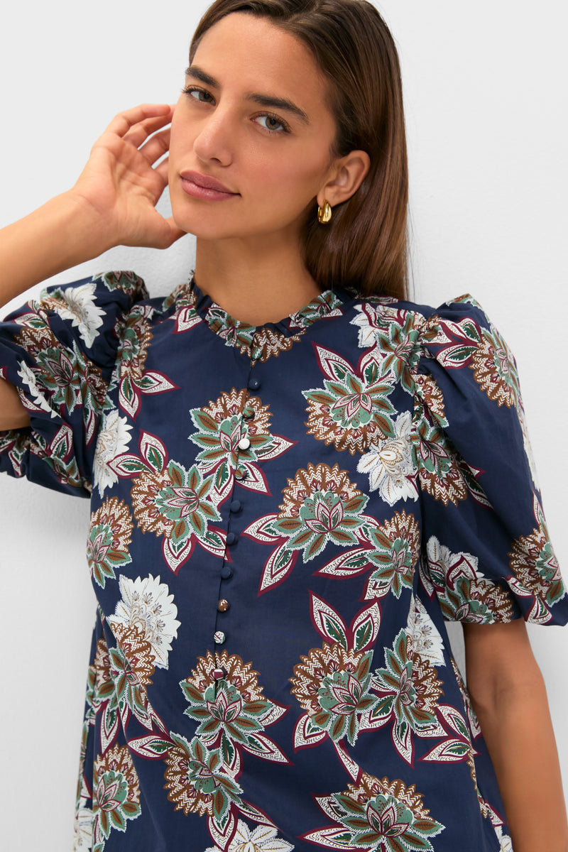 Navy Floral Mimi Mini Dress with classic puff sleeves and ruffle collar, epitomizing effortless, fun style with a high-end floral print and button details.
