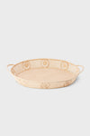 Raffia Round Tray: A classic, effortless woven tray with loop handles, perfect for high-end, fun entertaining or stylish tabletop decor, embodying a coastal, organic charm.