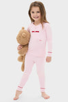Young girl in classic Pink Pima Cotton Arien Kid's Pajama Set, featuring a red bow and LILA embroidery, holding a teddy bear. Effortless, high-end comfort for fun family moments.