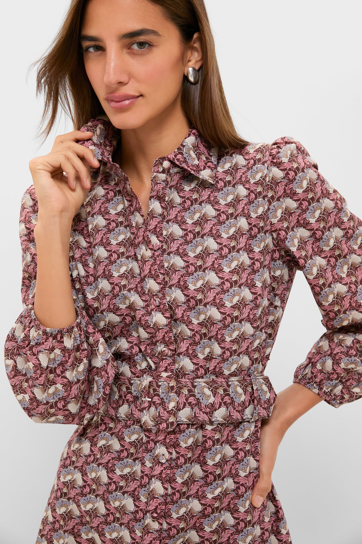 Model wearing the classic Plum & Dusty Blue Leafy Floral Kai Maxi Dress, exuding effortless elegance with its button placket and fun, high-end floral design.