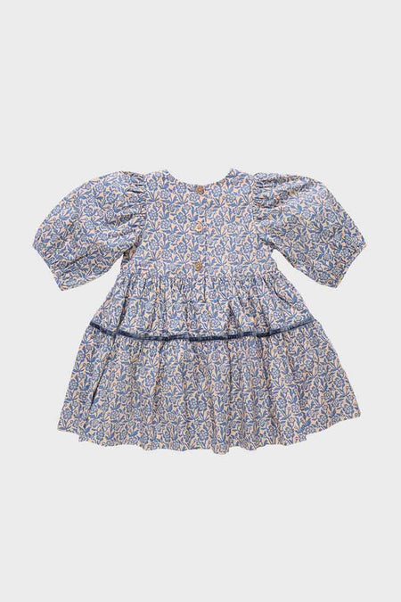The Pink Chicken Blue Climbing Floral Print Dress for girls features puffed sleeves, a gathered skirt, and a blue and white floral pattern. Shown here on a plain white background.