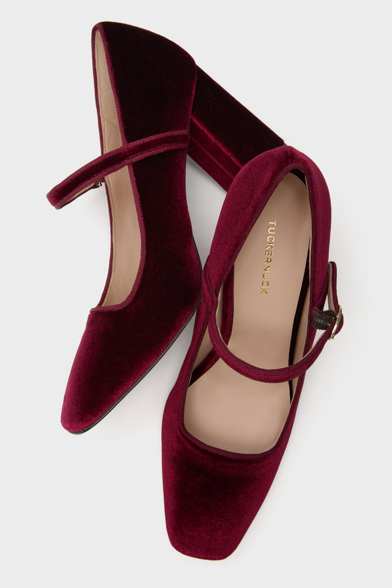 Oxblood Velvet Julia Heels: Classic Mary Jane pumps with a block heel, closed round toe, and adjustable strap. Effortless elegance in high-end velvet, perfect for fun, versatile styling.