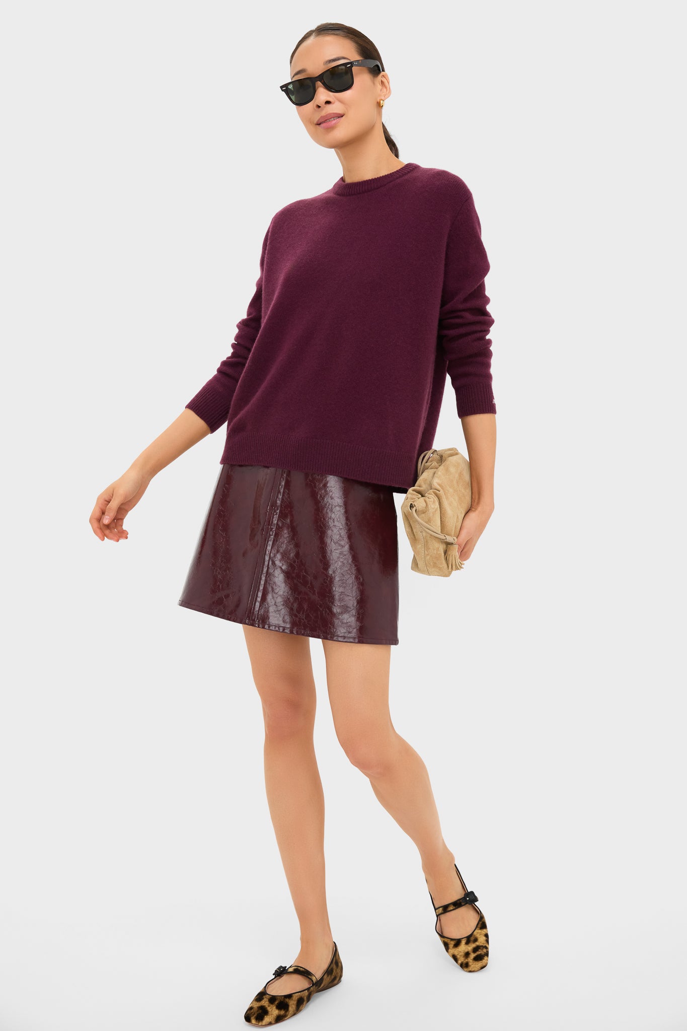 Model wearing the classic Winetasting Cashmere Bodie Boyfriend Crewneck, showcasing an effortless, fun, high-end style with relaxed fit and crewneck design.