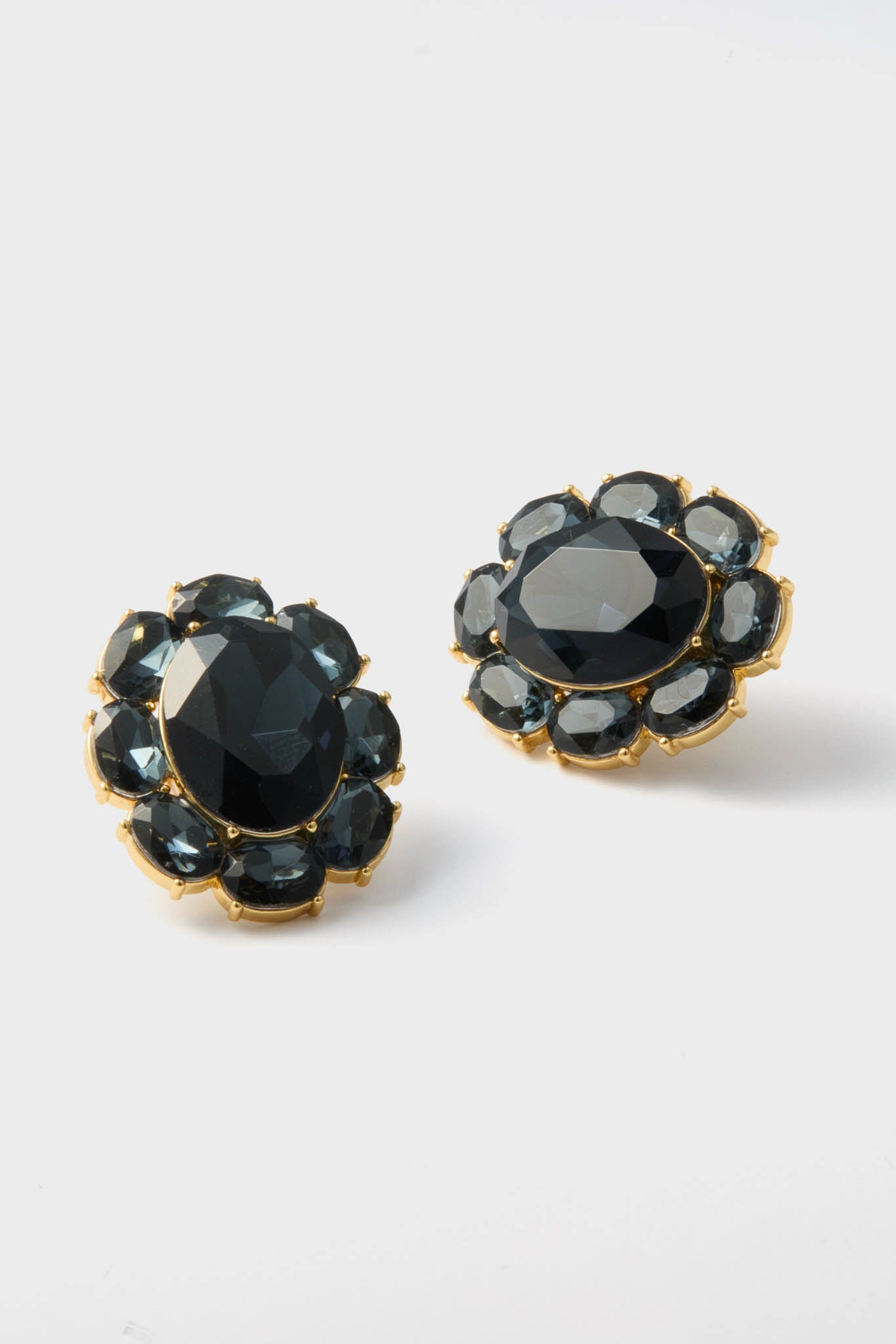 Navy Crystal Emaline Studs showcase classic elegance with faceted black stones and smoky-gray accents, offering an effortless, high-end flair for any outfit.