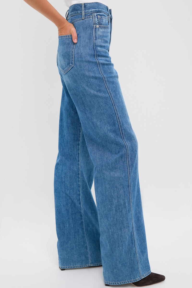 French Kiss Taylor High Rise Wide Leg jeans exude effortless style with their classic wide-leg silhouette in premium Italian denim, embodying a fun, high-end look.
