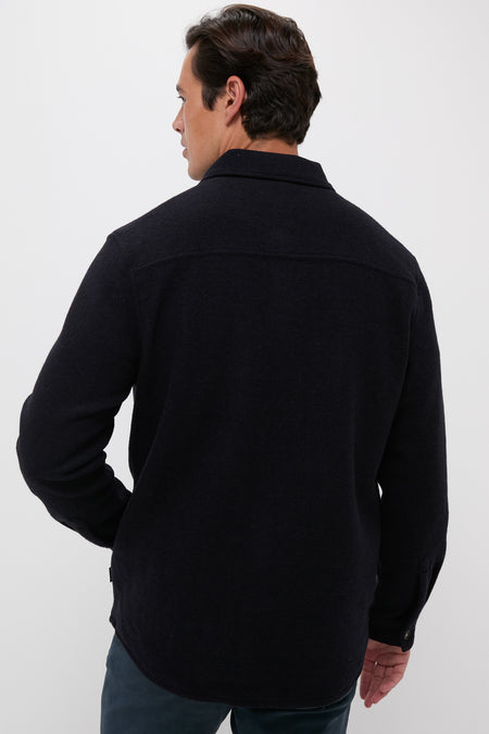 Man wearing the classic Navy Marl Marlow Tailored Wool Blend Overshirt, showcasing its effortless style with buttoned cuffs and a sleek silhouette for high-end, versatile dressing.