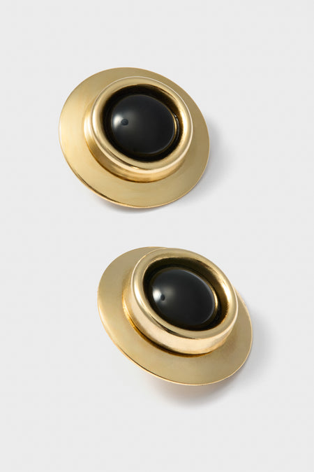 Onyx Alva Earrings: Classic and effortless round gold-tone earrings with domed black cabochons, perfect for adding a fun, high-end touch to any outfit.