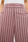 High-waisted Mauve Stripe Wyatt Pants with classic wide-leg silhouette and vertical stripes, offering an effortless, fun style with belt loops and front pockets.