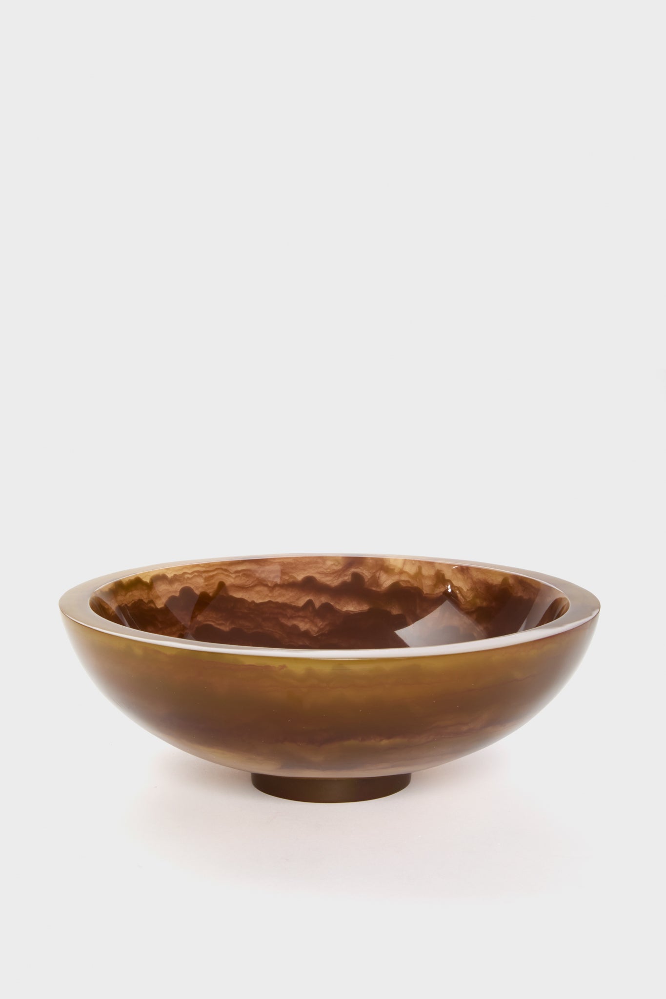 The Lily Juliet Sorrento Bowl features a glossy brown tortoise finish in a round, shallow design, crafted to be a true conversation piece.