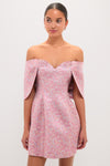 Model wearing the Pink Multi Jacquard Off-the-Shoulder Kara Midi Dress, showcasing its classic sweetheart neckline, structured draped sleeves, and effortless, slightly flared skirt.