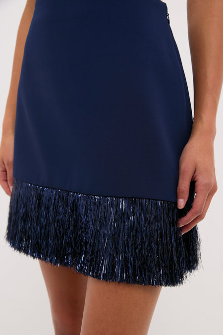 Navy Metallic Fringe Francie Mini Skirt, showcasing classic, effortless style with a fun, high-end metallic fringe trim, perfect for confident, cool looks.