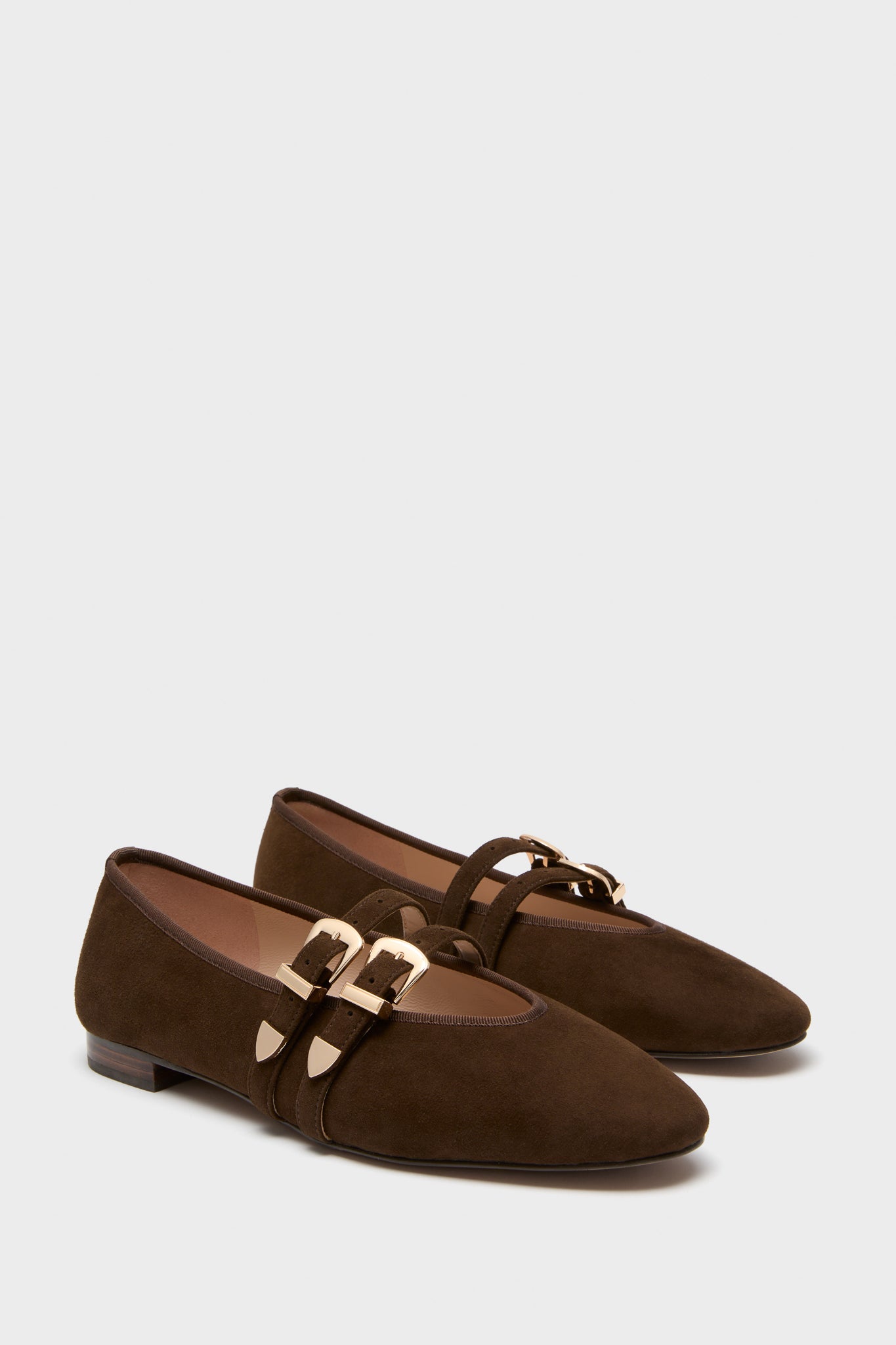 Chocolate Suede Buckle Nina Flats: Effortlessly chic women's flats with pointed toes, almond silhouette, and gold buckle straps. Classic suede finish and high-end design for versatile, fun style.