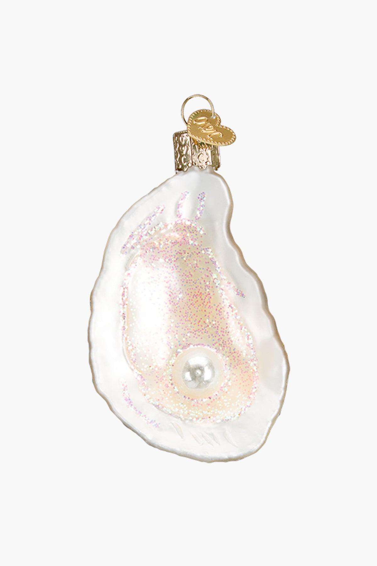 Add coastal charm to your holiday décor with the Old World Christmas ornament—a glass-blown oyster shell featuring a pearl inside, iridescent glitter details, and a gold hanging cap.