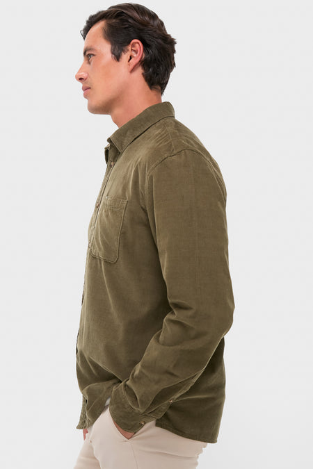 Man modeling Olive Bramside Relaxed Cord Shirt, a classic, high-end corduroy piece with a casual, effortless style, perfect for fun, versatile autumn wear.