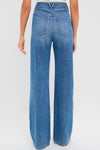 French Kiss Taylor High Rise Wide Leg jeans, showcasing a classic, effortless style with a wide-leg silhouette and V-shaped yoke, perfect for high-end, fun fashion.