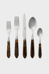 A set of five Sabre Paris silverware pieces—two forks, a knife, a tablespoon, and a teaspoon—with silver heads and brown marbled handles, arranged side by side.
