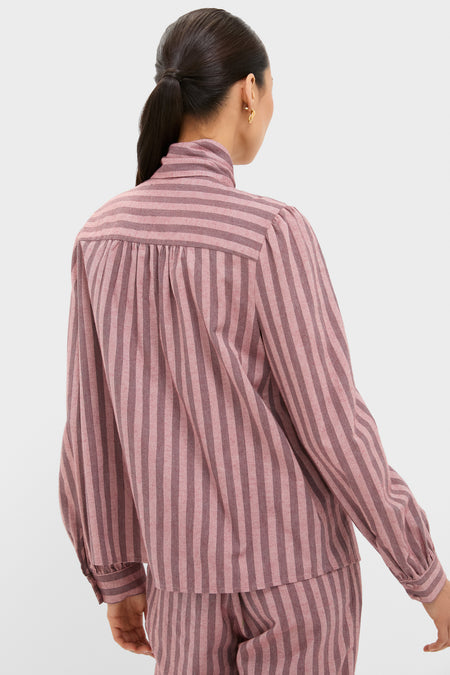Model wearing the Mauve Stripe Brianna Bow Blouse, showcasing its classic design with an effortless, fun, high-end style; features include a back yoke and gathered detailing.